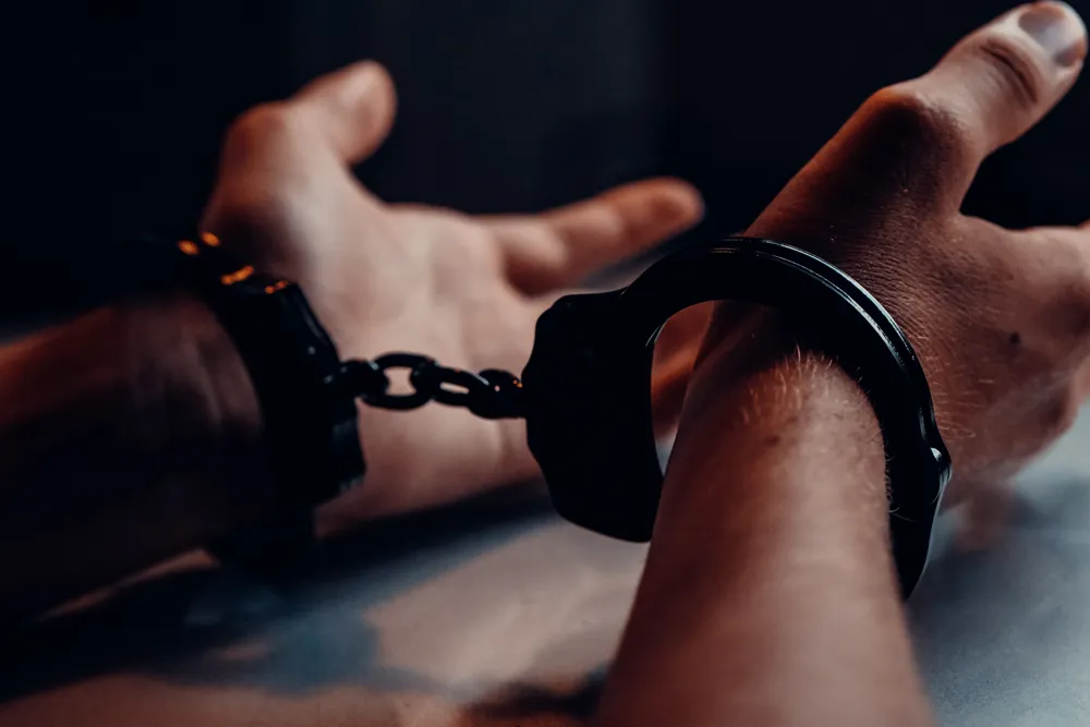 Hands in handcuffs